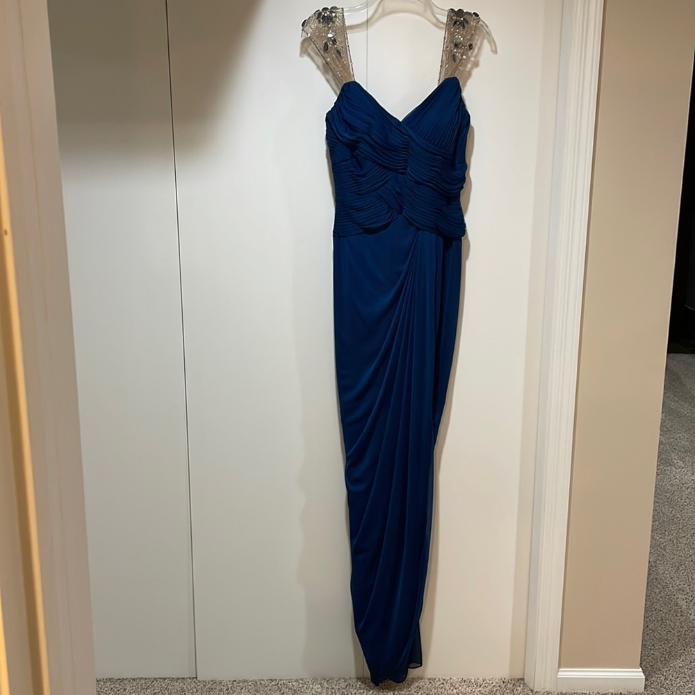 Navy, full length, lined, zipper back, semi “train” in back, gathered side front